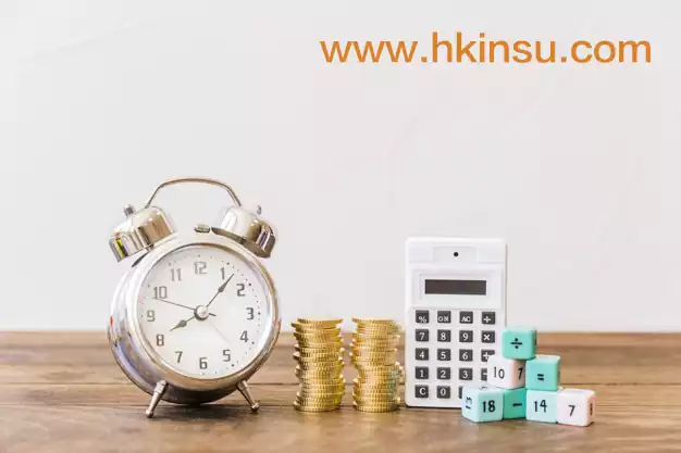 alarm clock stacked coins calculator math blocks wooden desk 23 2147863934 香港保险退保,我们应该注意哪些问题?